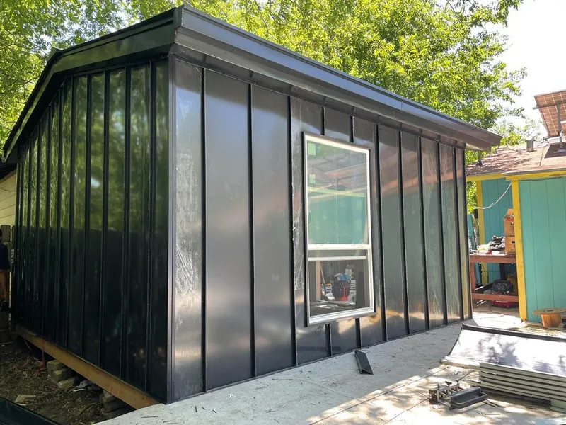 Black standing seam metal wall panels for Roof Inspection in Shrewsbury